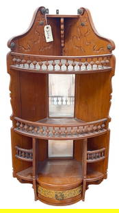 Victorian Walnut Hanging Corner Shelf: Carved ribbons, mirrored back. One single drawer. Measures 43 inches high, 15 inches wide on each side. Overall good condition, please see photos.