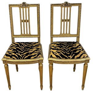 Pair Louis XVI Gilt Decorated Faux Tiger Upholstry Side Chairs: Overall good condition. Measures 36 inches high, 15 inches wide, 16 inches deep.