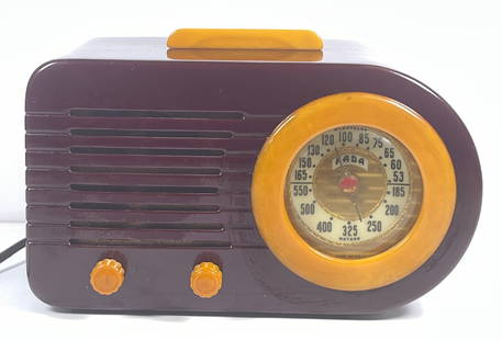 FADA Bullet Bakelite Radio Model 1000: Fada Bullet Bakelite RadioBrown Bakelite Catalin radio with butterscotch bezel and knobs6 inches high not including handle x 10.5 inches wide x 5.5 inches deep. Overall good working condition.