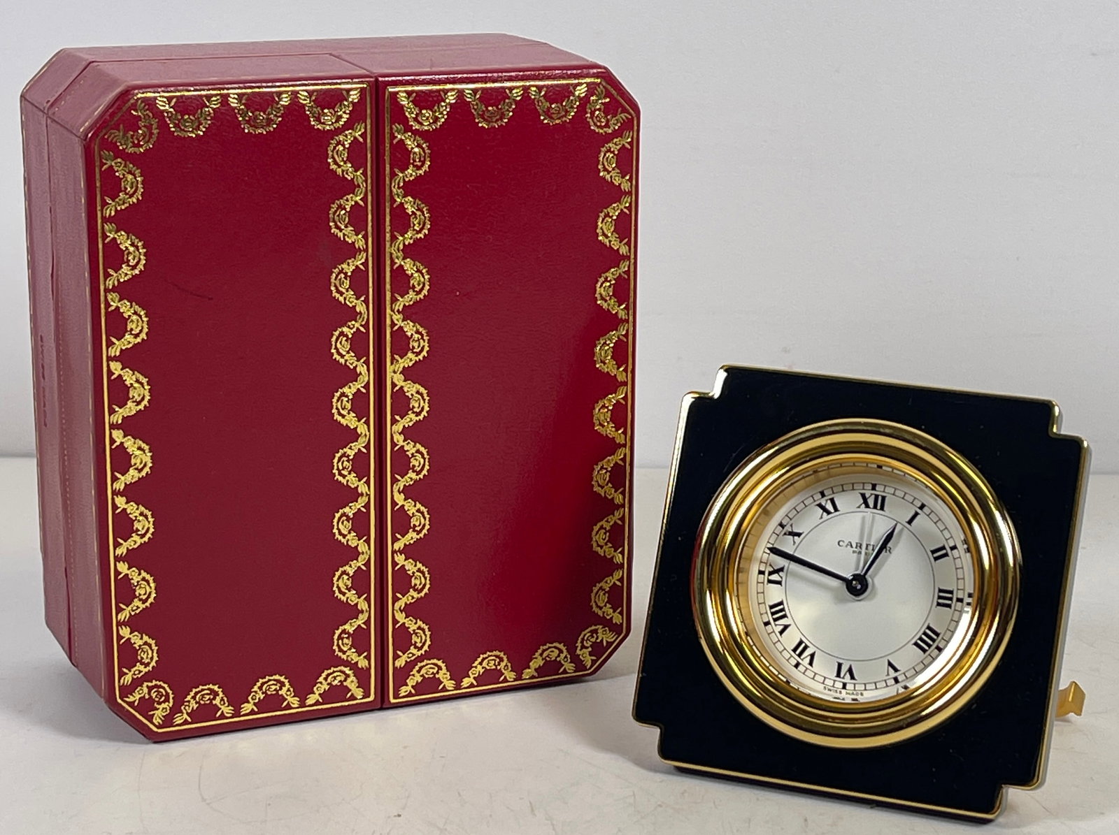 Cartier Gilt Metal and Enamel Travel Clock in Original Box: Cartier Gilt-Metal and Enamel Travel ClockStamped. 3 x 3 in. Overall very good condition, please see photos.