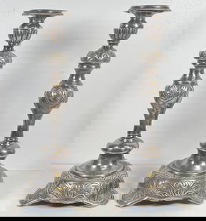 Pair Antique Solid Sterling Silver Candlesticks: Marked sterling onthe bottom. Measures 13.25 inches high, 5.5 inches across the bottom. Overall good condition, some light dents from age, please see photos. Total weight 946 grams (30.4 ozt).