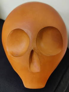 Alexander Ney Hand Carved Smooth Terracotta Skull Sculpture: Alexander Ney (Russian Federation, New York, France, b. 1939 - ) smooth Terracotta Skull sculpture in burnt orange. A cast and hand carved sculpture in excellent condition. Sculpture has natural separ