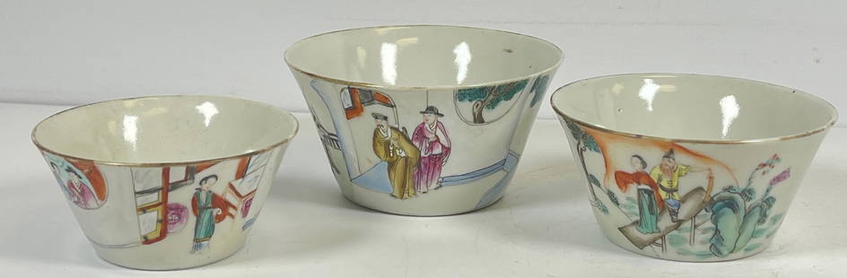 Antique (3) Chinese Qing Dynasty Nesting Bowls: Set (3) Chinese famille rose nesting bowls, Qing Dynasty (19th c.), gilt and polychrome enameled porcelain, the cups decorated with figures in courtyard settings, unmarked. Largest measures 1.875 x 3.