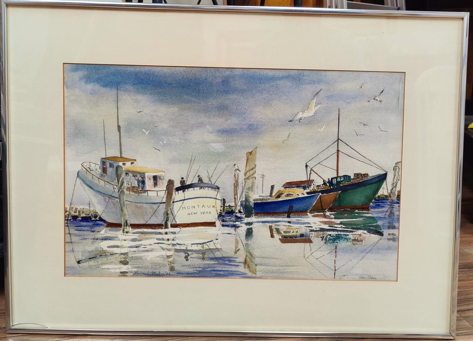 Signed W/C Folk Art Style Painting Montauk Harbor, 1968: W/C work of Montauk in very good condition, signed and titled in the lower. 21.5" x 13.5" sight.