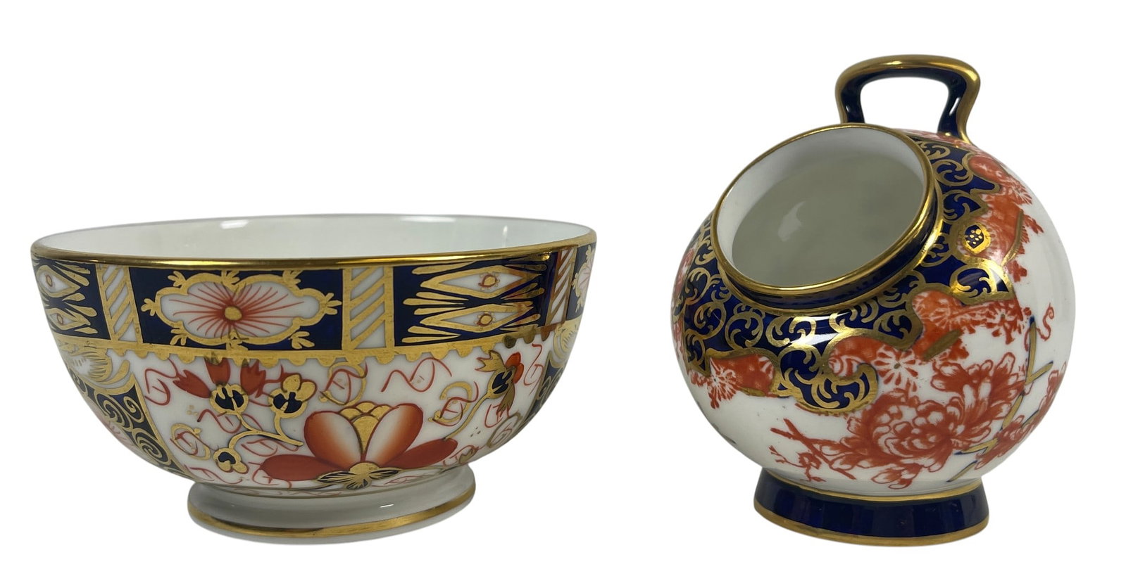 Lot of 2 Royal Crown Derby Imari Salt Pig & Open Sugar Bowl: Bowl measures 2 inches high, 4 inches wide. Salt pig measures 3.5 inches high. Overall good condition, no chips or cracks.