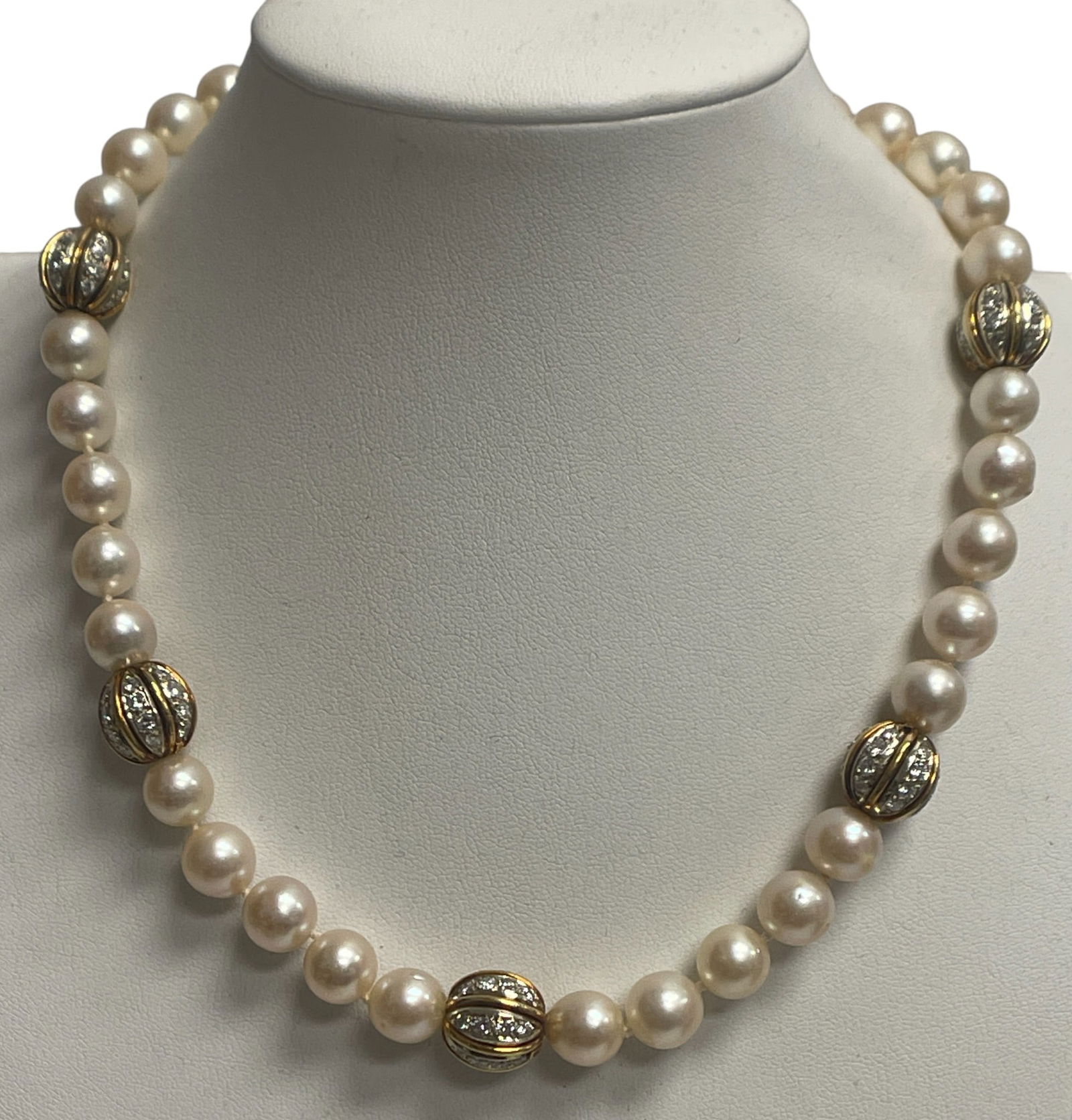 Estate 18k Yellow Gold Diamond & Pearl Necklace: Measures 18.25 inches long. Each diamond cluster holds approx 1.5 carats of diamonds for a total of approx 9 carats. Pearls are approx 7mm each. Overall very good condition, please see photos. Total w