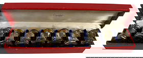 Box set of (8) Cartier Sterling Salt & Pepper Shakers: Comes in original box - 4 salts and 4 peppers. Sterling silver with gilded tops. Overall good condition, need to be polished. Comes from a mid town Manhattan estate.