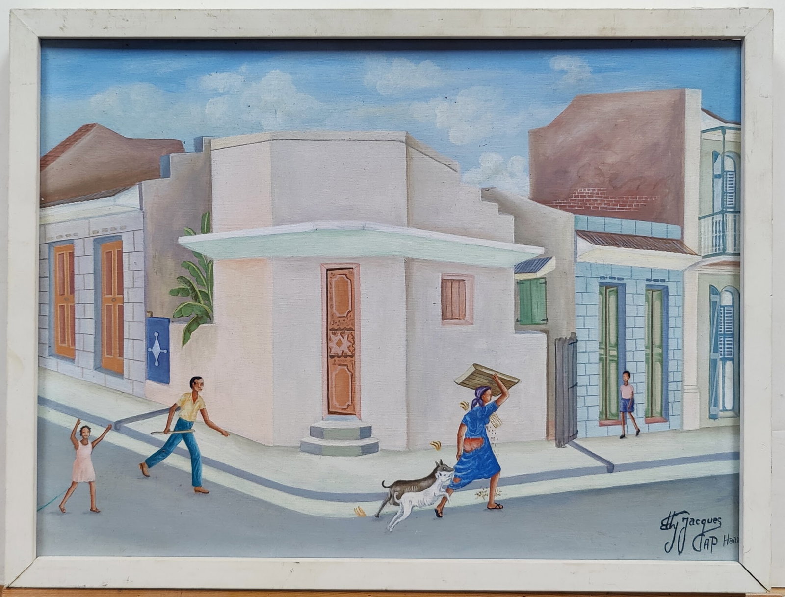 Eddy Jacques O/B Haitian Street Scene Painting: Eddy Jacques (Haiti, b. 1957 - ) O/B Haitian street scene in very good condition. White painted wood edge framing in good condition, with wear around the edges. Notations on verso. Signed lower right.