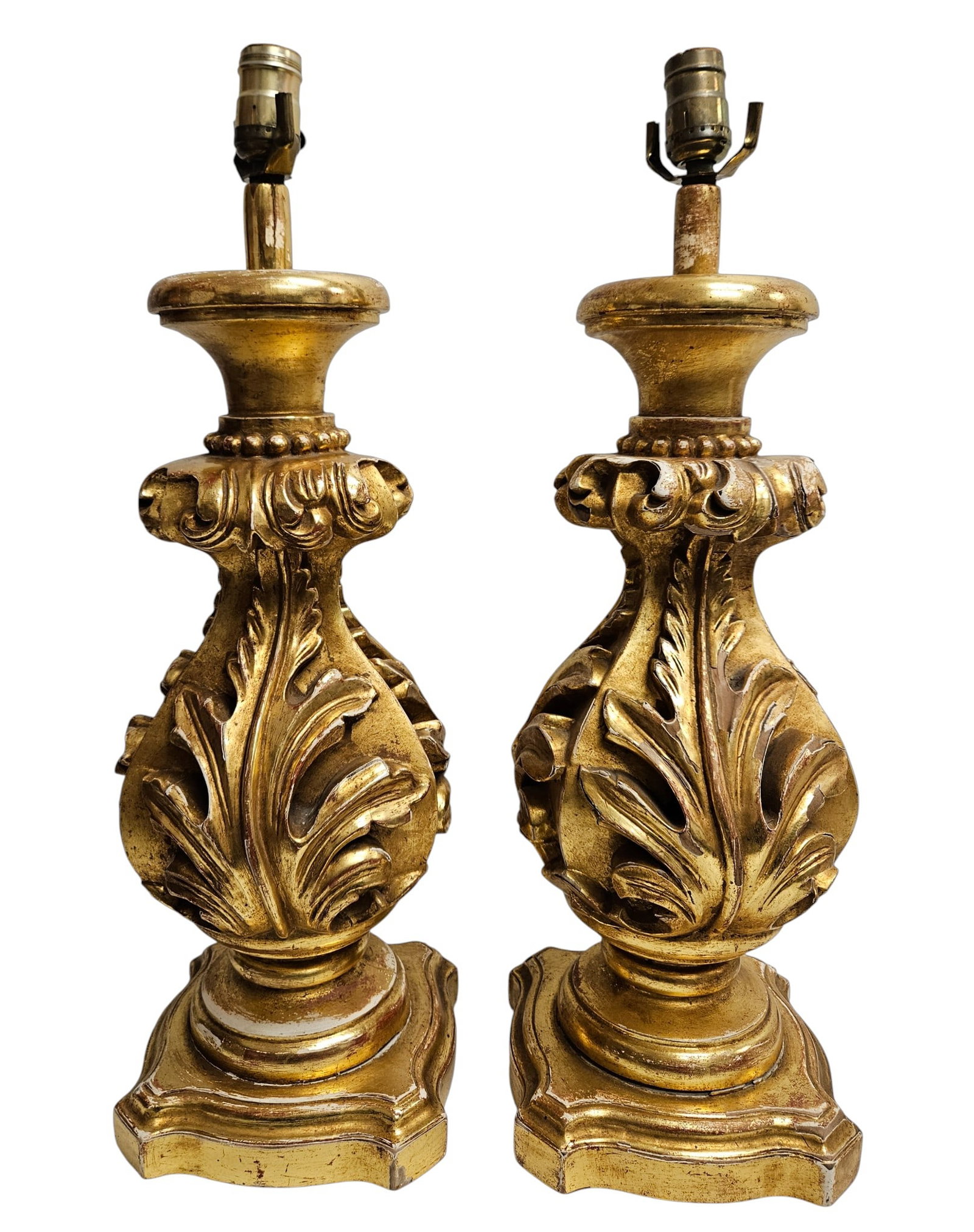 Pair Italian Baroque Carved Gilt Wood Lamps: Lamps measure to the socket 23 inches high, approx 8 inches wide. Overall good condition, please see photos.