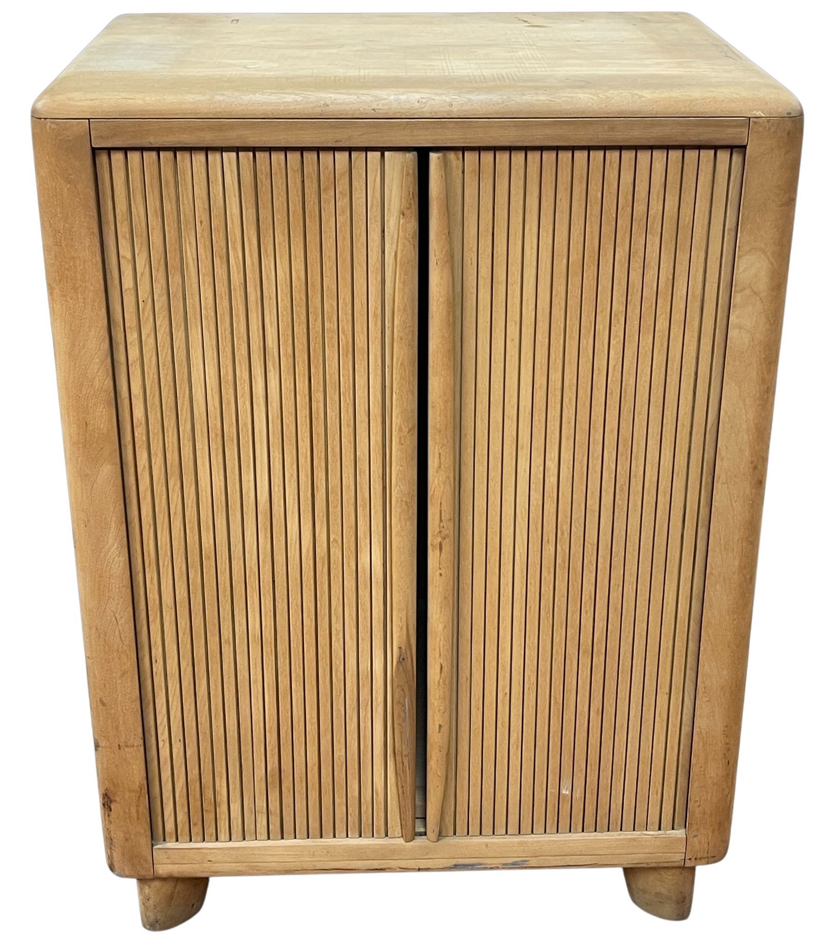 Heywood Wakefield Streamline Tambour Door Cabinet: Tambour door front in blonde finished maple. Measures 32.5 in. x 23.75 in. x 14.25 in. Signed on back. Overall good condition with mild surface wear. Please see photos.