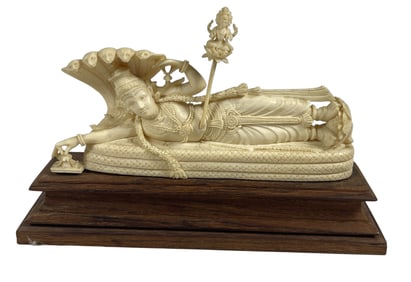 Vintage Oriental Carved Figure of Reclining Deity on Cobra Throne