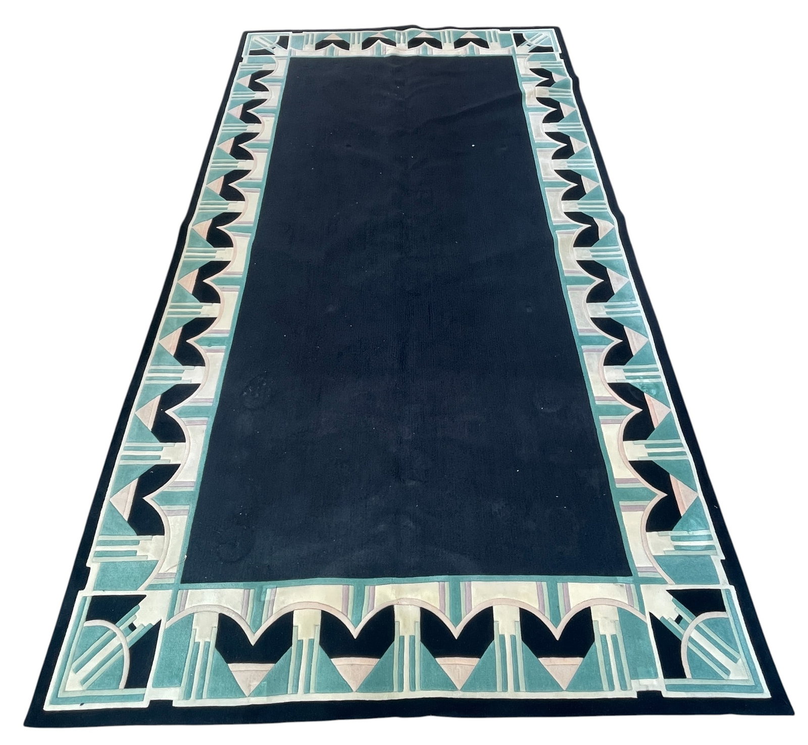 Edward Fields Art Deco Style Rug 10 x 16: Large geometric rug in hues of blue and pink with a black ground. Measures 10 feet x 16 feet. Overall very good condition, please see photos.