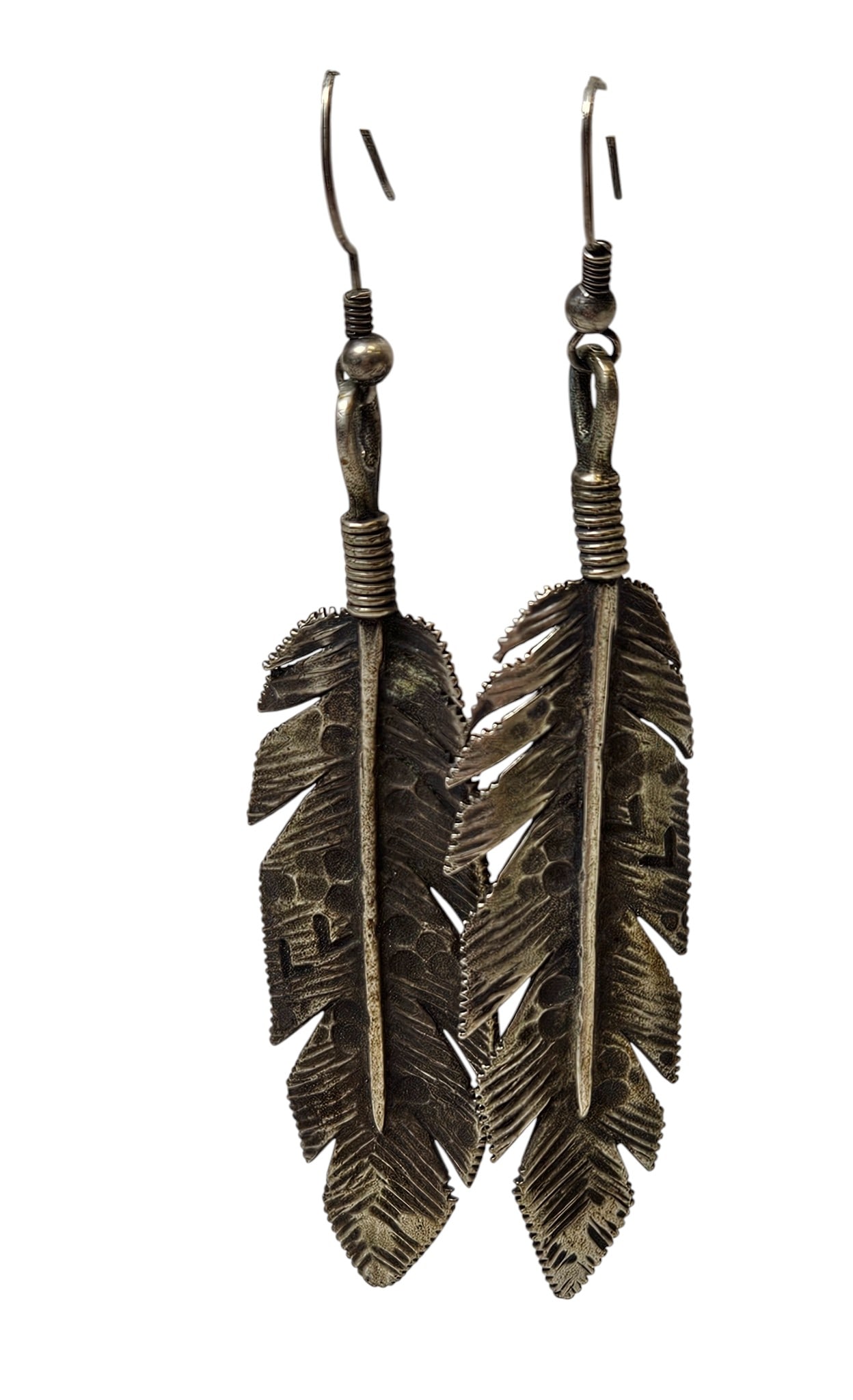 (3) Pairs of Native American Sterling Silver Earrings: To include Zuni owl earrings (1.75 inches long), Navajo feather earrings marked Richard Lindsey (approx 3.5 inches long), and Navajo turquoise & coral floral earrings (1.125 inches long). Total