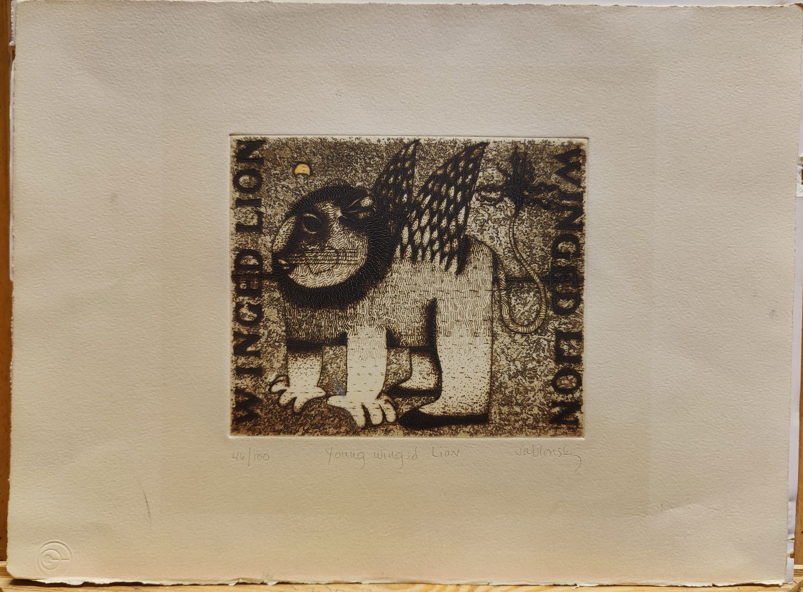 Carol Jablonsky L/E Etching Titled Young Winged Lion: Carol Jablonsky (New York, 1939 - 1992) etching on cotton rag edged paper, in good condition, with toning, mat burn, scuffing and minor foxing. Pencil signed, titled and numbered 46/100. There is a ni