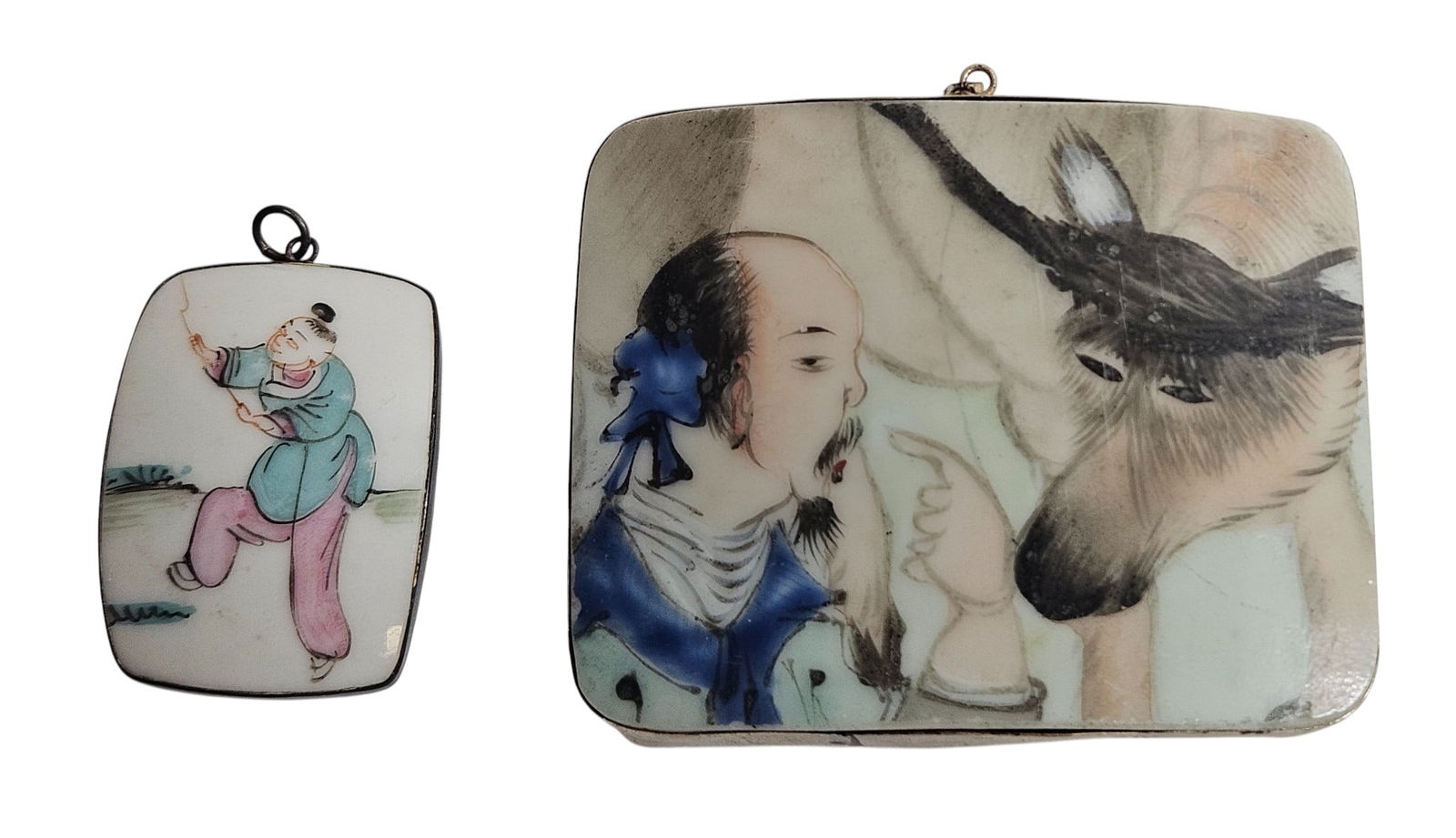 Lot of (2) Chinese Sterling Silver & Porcelain Pendants: Largest measures 3 inches x 2.375 inches. Overall good condition, please see photos.