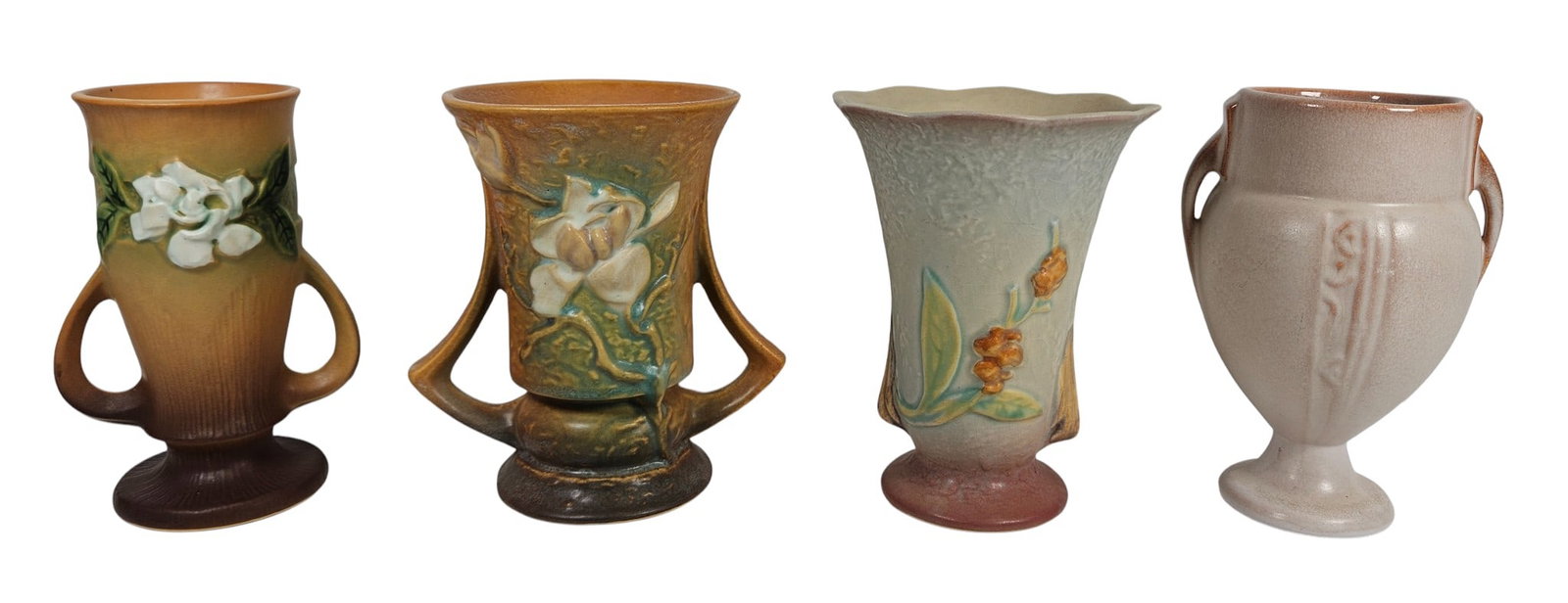Lot of (4) Roseville Art Pottery Vases: To include Roseville Gardenia vase (6.25 inches high), bittersweet vase (6.25 inches high), moderne vase (6.5 inches high), magnolia double handle vase (6.25 inches high). Overall good condition, plea