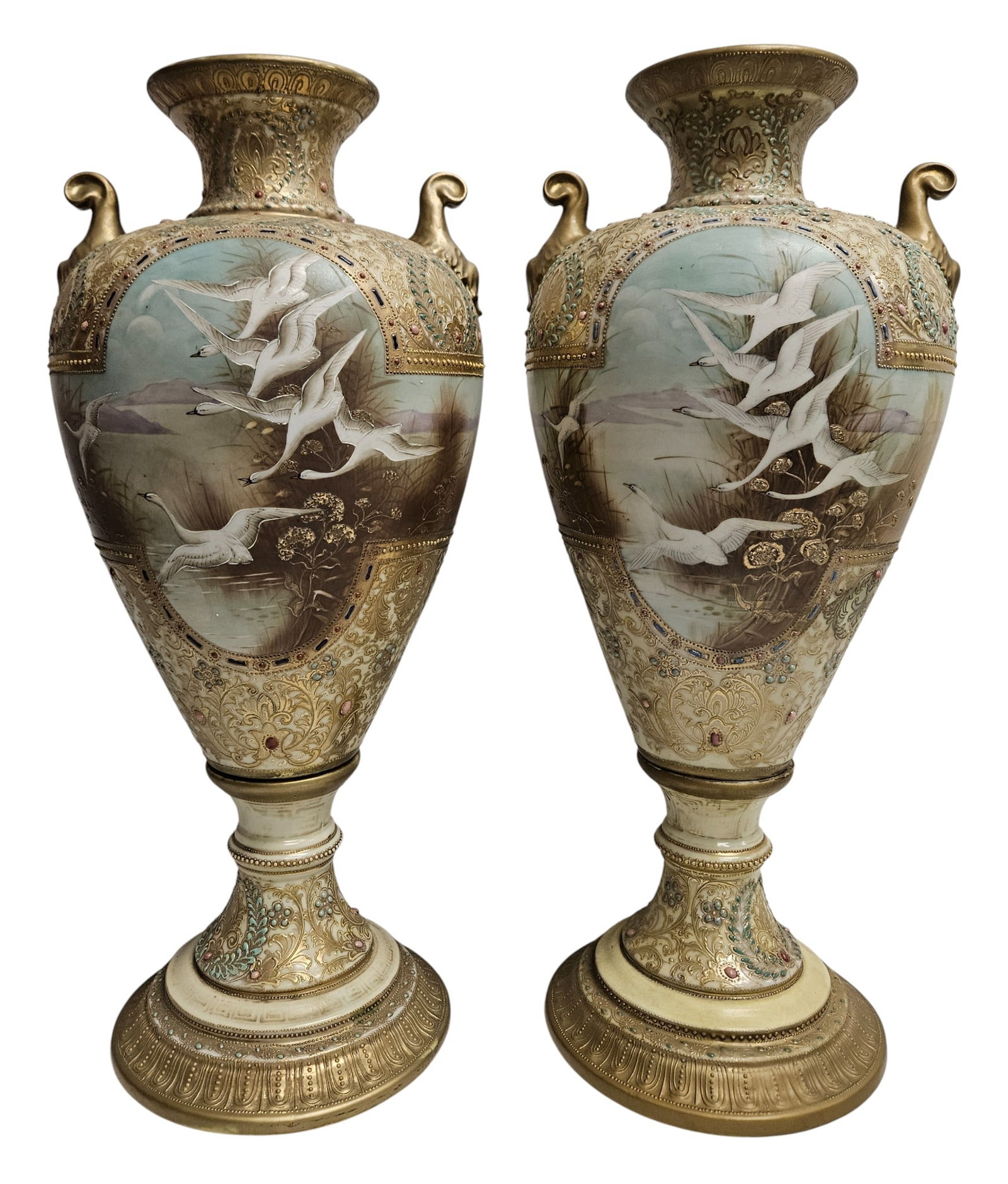 Impressive c1900 Pair Nippon Hand Painted & Moriage Urn Vases: Comprising an ornate and impressive Moriage and gilt decorated double handled urn form vase on raised square base with landscape and gilt highlights. One has a green mark, one has a blue mark. They