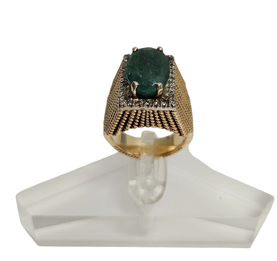 Mid Century 14k Yellow Gold Diamond & Cabochon Emerald Ring size 7: (32) total diamonds surrounding a central oval cabochon emerald. Total weight 15.6 grams. Overall good condition, please see photos.