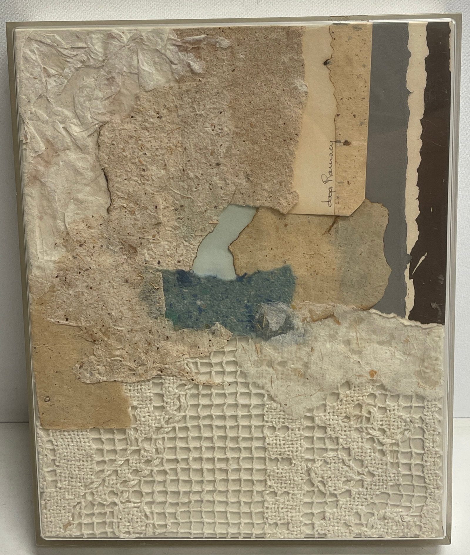 Daga Ramsey M/M Fabric Collage, "Iceland Series", c.1980s: Daga Ramsey (Sag Harbor, Texas, 1909 - 1997) fabric and cloth collage from the "Iceland Series". Very good condition and simply framed in a Lucite cover frame. Signed vertically upper right. Signed