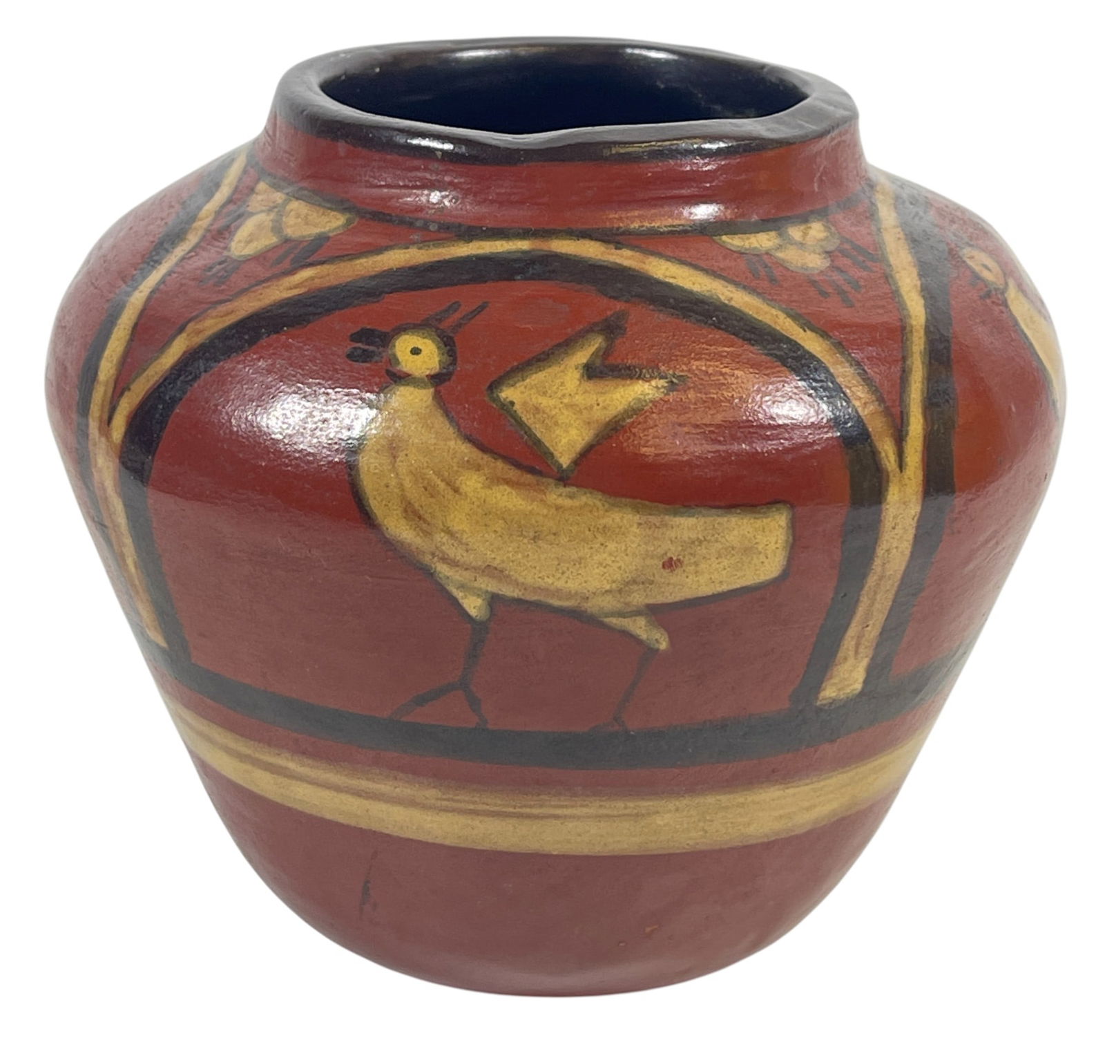 North Dakota School of Mines Native American Vase: Native American inspired design with a sgraffito design featuring birds and foliage. Measures 4.75 inches high, approx 6 inches at its widest. Artist signed on bottom, B L Christenson. Overall good