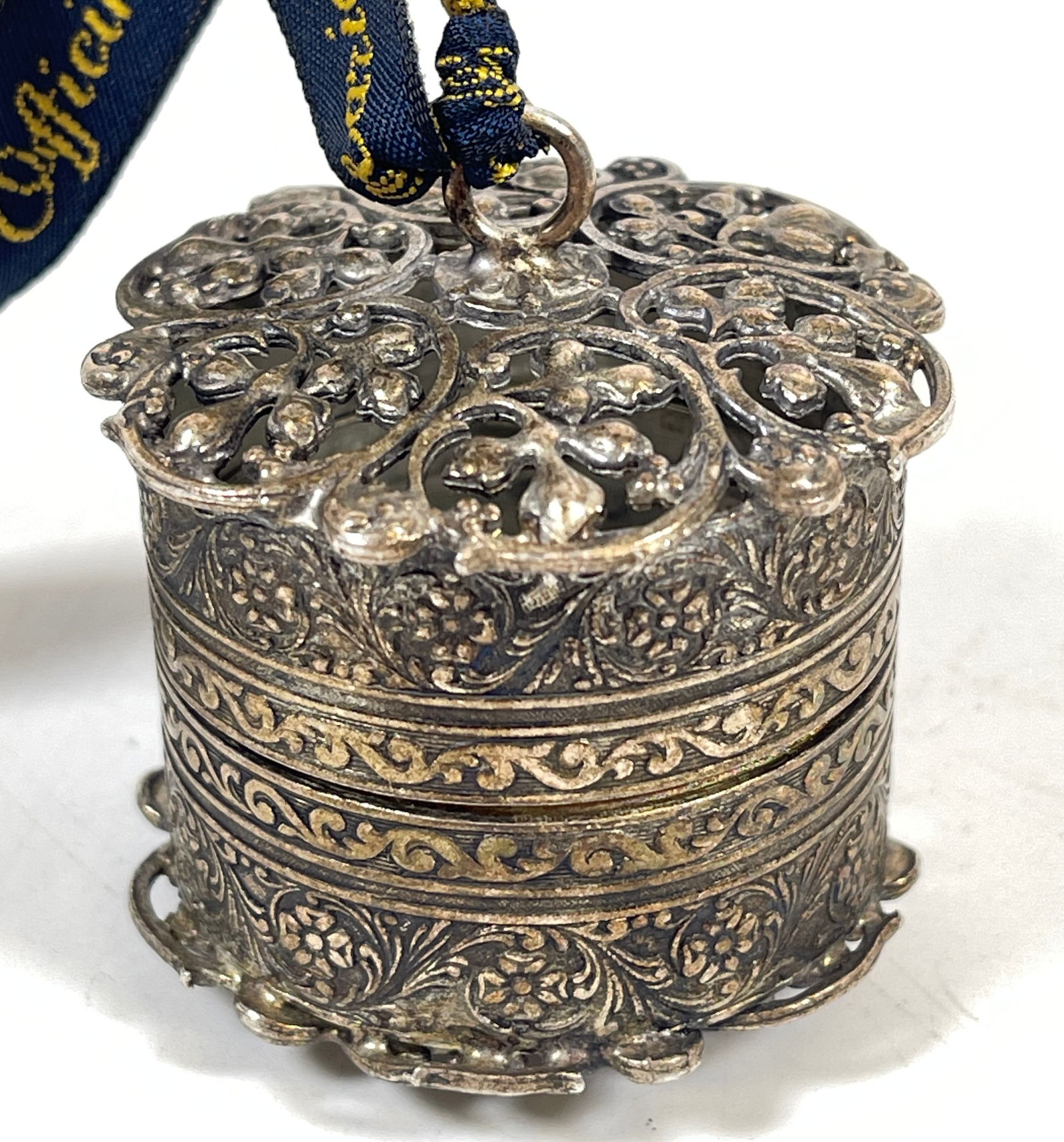 19th Century Continental Silver Hinged Pot Pourri Holder: Comes with a lanyard S Maria Novella, we do not know if it is original. Measures 1.125 without bale, 1.875 in diameter across the bottom. Weighs 1.8 ozt (54.8 grams). Overall good condition.