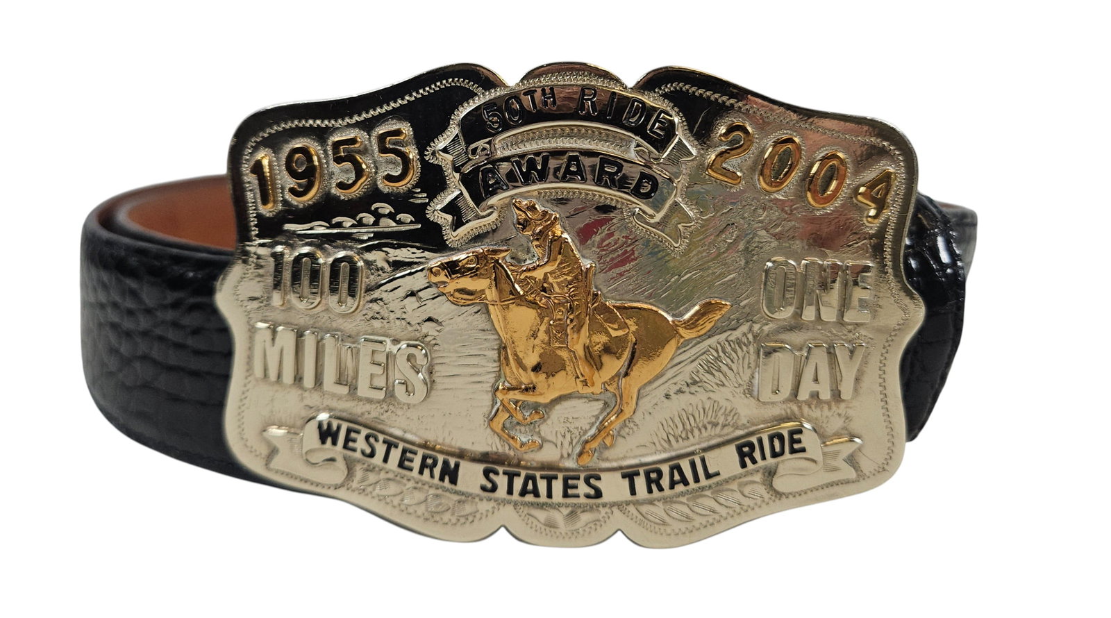 Vintage Comstock German Silver Western Buckle with JW Cooper Alligator Belt: Buckle measures 4 inches wide x 2.75 inches high. SIze 38J.W Cooper Alligator belt (43.75 inches long, 1.5 inches wide). Overall good condition, please see photos.