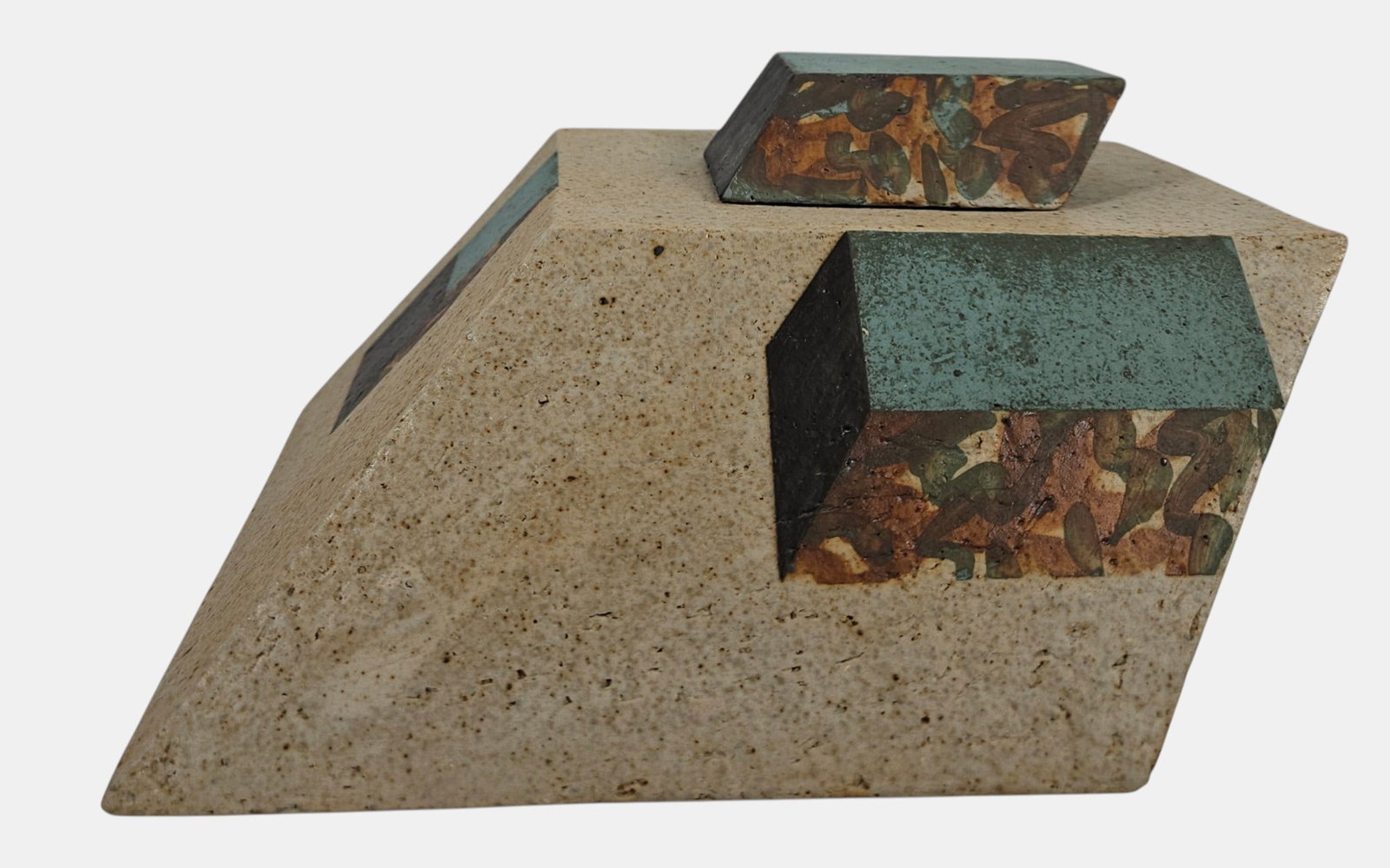 Karen Bennicke (Danish, B. 1943) Geometric Art Pottery Sculpture: Signed on the underside "K.B. Denmark". Measures 4 inches high, 8 inches wide, 6.25 inches deep. Overall good condition, the top piece comes off, one of the prongs has broken off, please see photos.