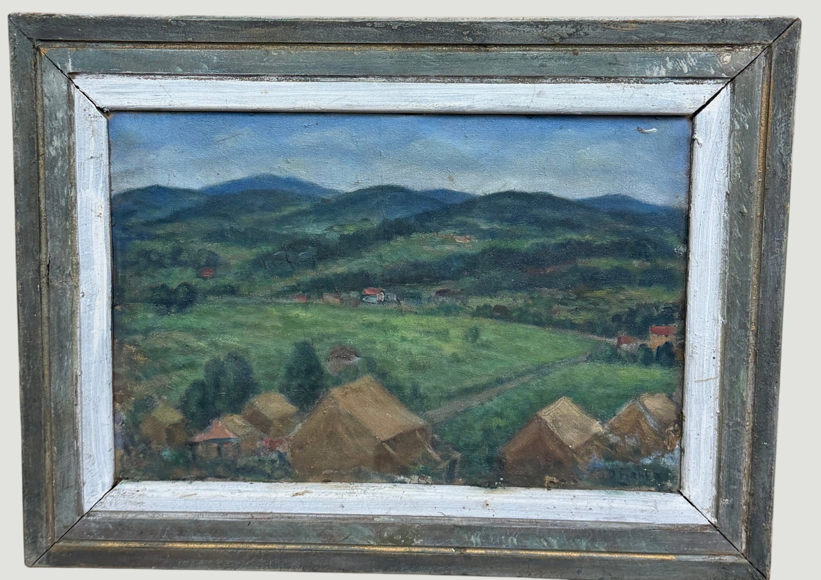 Oscar Fisher WPA Era Oil on Board Impressionist Landscape: A c1960s O/B depicting a serene pastoral scene with thatched roof in forefront, set against a backdrop of sweeping green fields, dirt pathways, speckled houses and distant mountains. Framed measures