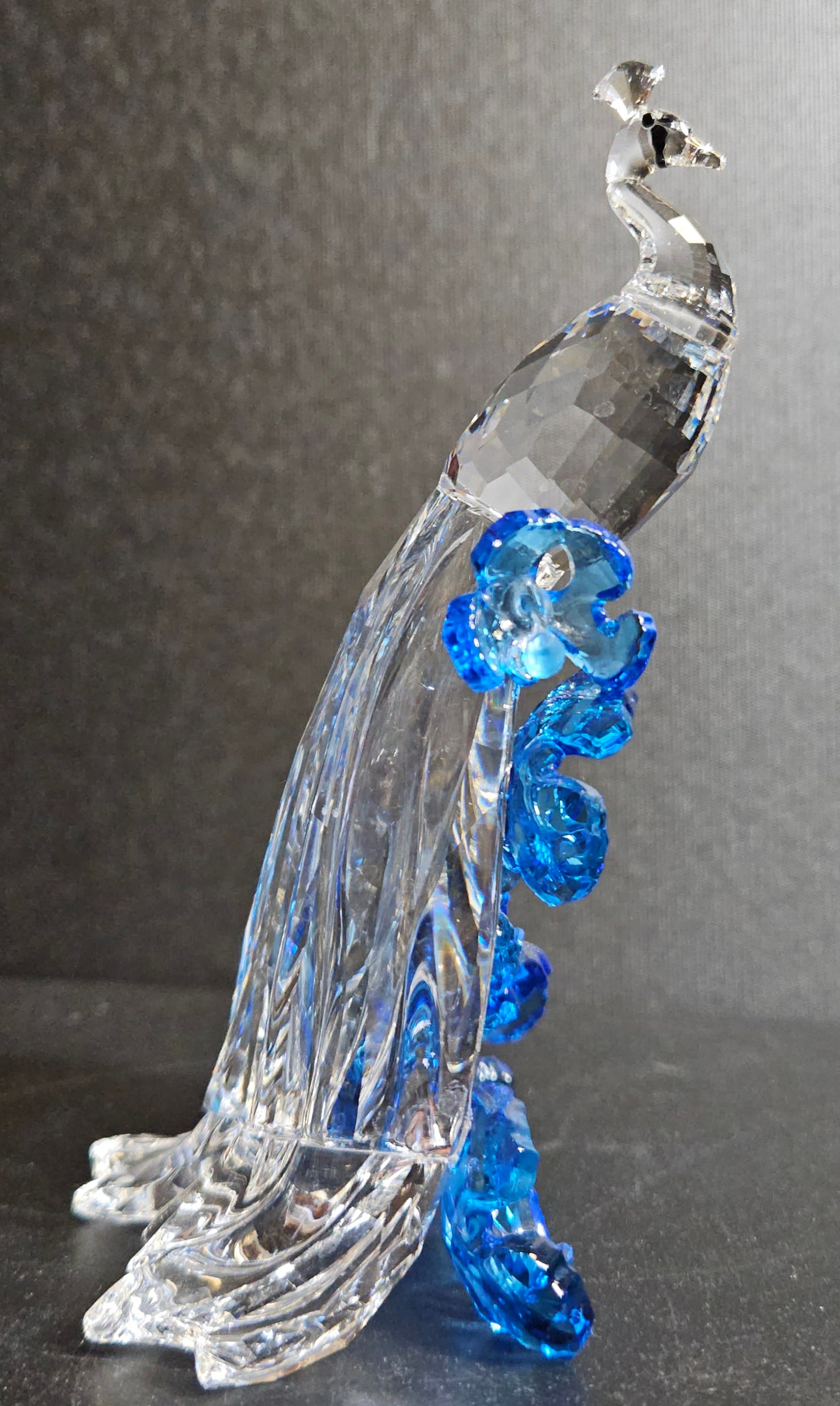 Swarovski SCS 2015 Crystal White Peacock: Swarovski, White Peacock Crystal Sculpture, 5063695, 2015, faceted clear crystal body with blue floral motifs along train, marked, with original box. In excellent condition. Please see our other lots