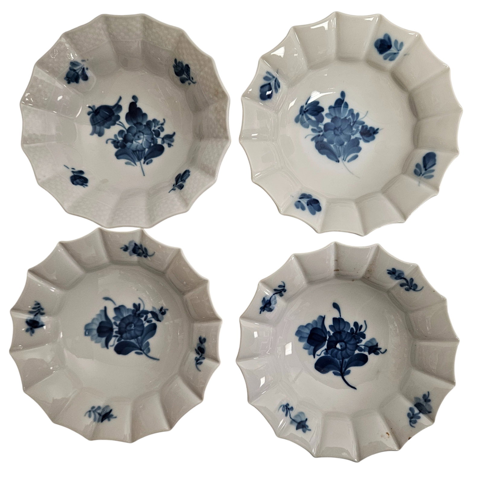(6) Royal Copenhagen Blue Fluted Porcelain Items: Bowls: (3) are numbered 10/8556, (1) numbered 10/8008. Measure 1.75 inches high, 6.625 inch diameter. Overall good condition, no chips or cracks. Other porcelain items: one dated 1975-79, the other