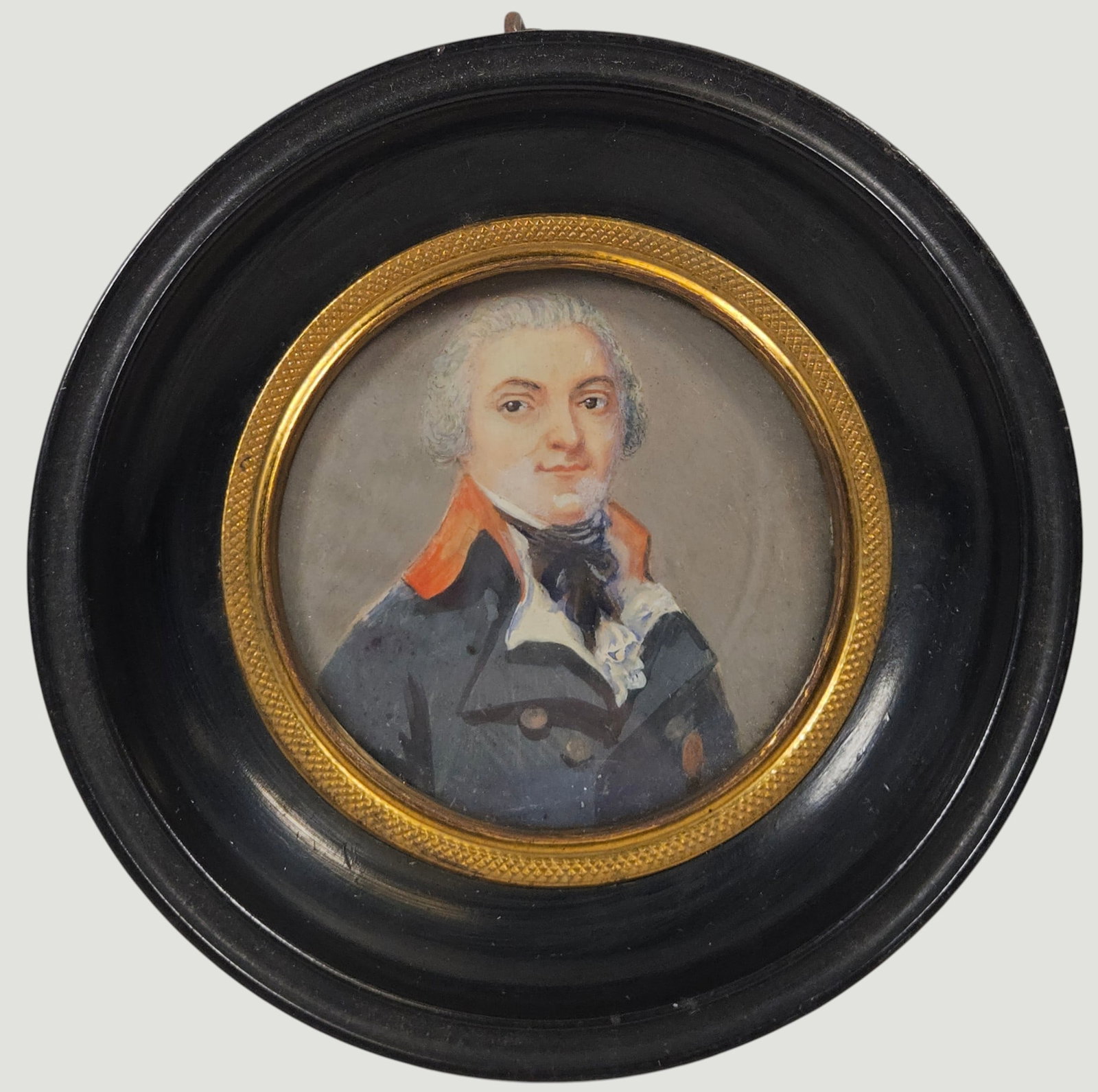 19th Century French Portrait Miniature Aristocrat: Unsigned. Housed in a traditional ebonized frame with a bronze border. Frame measures 4 inch diameter, portrait is 2.25 inch diameter. Overall good condition, please see photos.