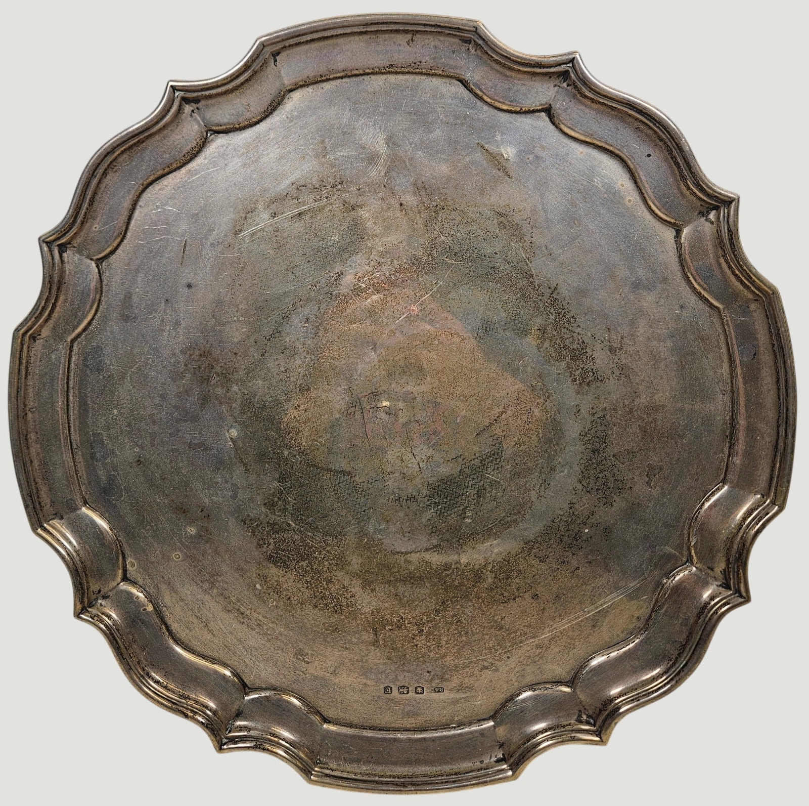 c1948 Sheffield England Sterling Silver Footed Tray: Hallmarked on the front, maker Roberts & Dore Ltd. Measures 14 inches in diameter, 1.25 inches high. Total weight approx 38.5 ozt. Overall good condition, no monogram.
