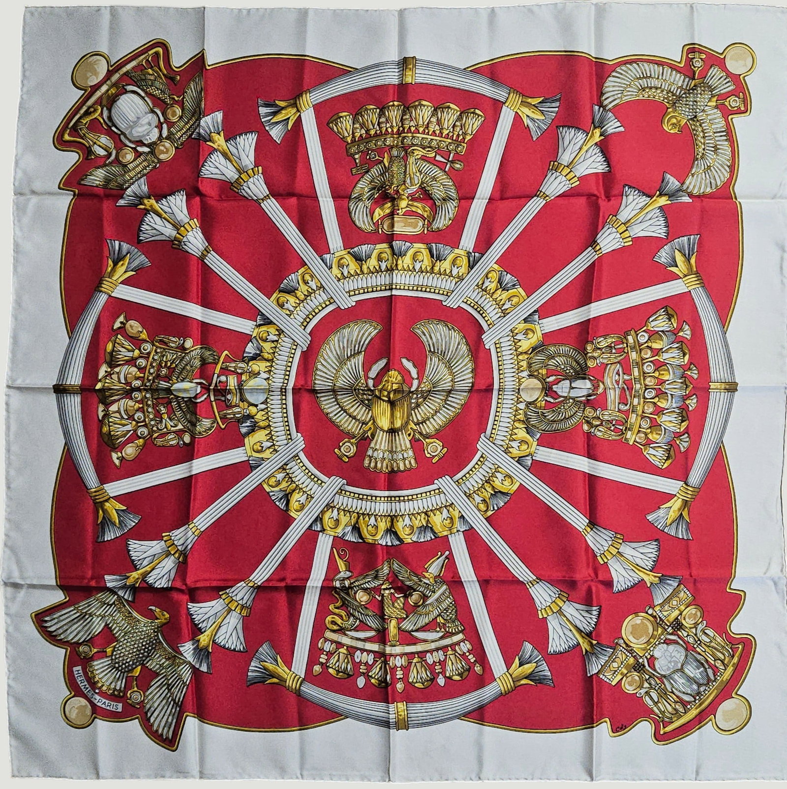 Hermes Egypte Silk Scarf: Features elaborate motifs inspired by ancienc Egyptian art, such as golden winged birds, papyrus stalks and ornate pectoral jewelry. Designed by Caty Latham, 1970. 90cm x 90cm. Appears to be unworn,