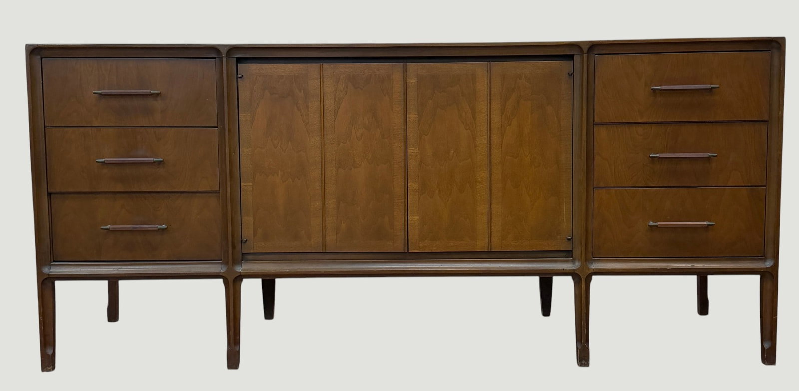 Mid Century Modern United Furniture Company Low Chest: Walnut construction with 6 outside drawers, and 6 inside drawers. Vanleigh label affixed over the United Furniture burned in logo. Measures 70 inches long, 19 inches deep, 31 inches high. Overall