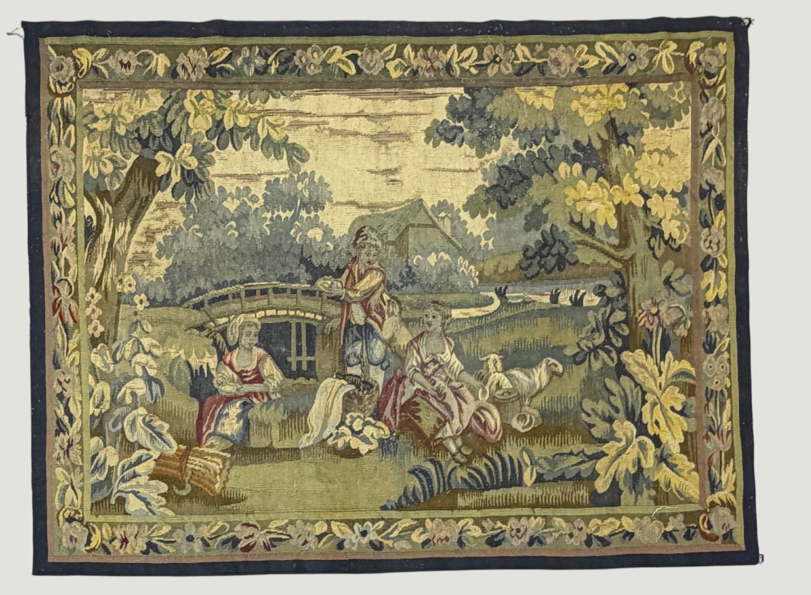 19th Century French Aubusson Style Woven Pastoral Wall Tapestry: Depicts figures in a pastoral landscape. Measures 67 x 51 inches. Overall good/fair condition. Tears and rips, please see photos.