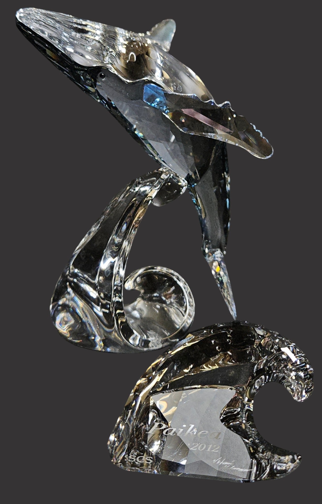 Swarovski Paikea Whale Crystal Figurine w/ Box: Swarovski crystal Paikea Whale art glass figurine. Model number: 1095228. Figure includes "Paikea 2012" plaque, and Swarovski original box. Measures approximately 6 inches tall. In excellent