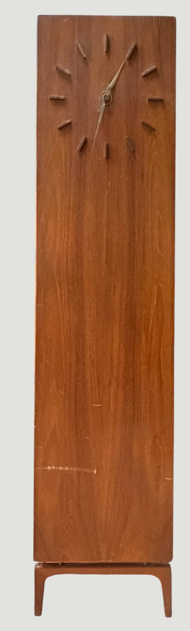 Mid Century Modern Danish Teak Grandfather Clock Cabinet Arne Hovmand Olsen: Built with a sleek, minimalist obelisk silhouette, featuring elegant minimalist brass index hours and matching slender hands. The tall front panel functions as a hidden locking door (lock missing) ope