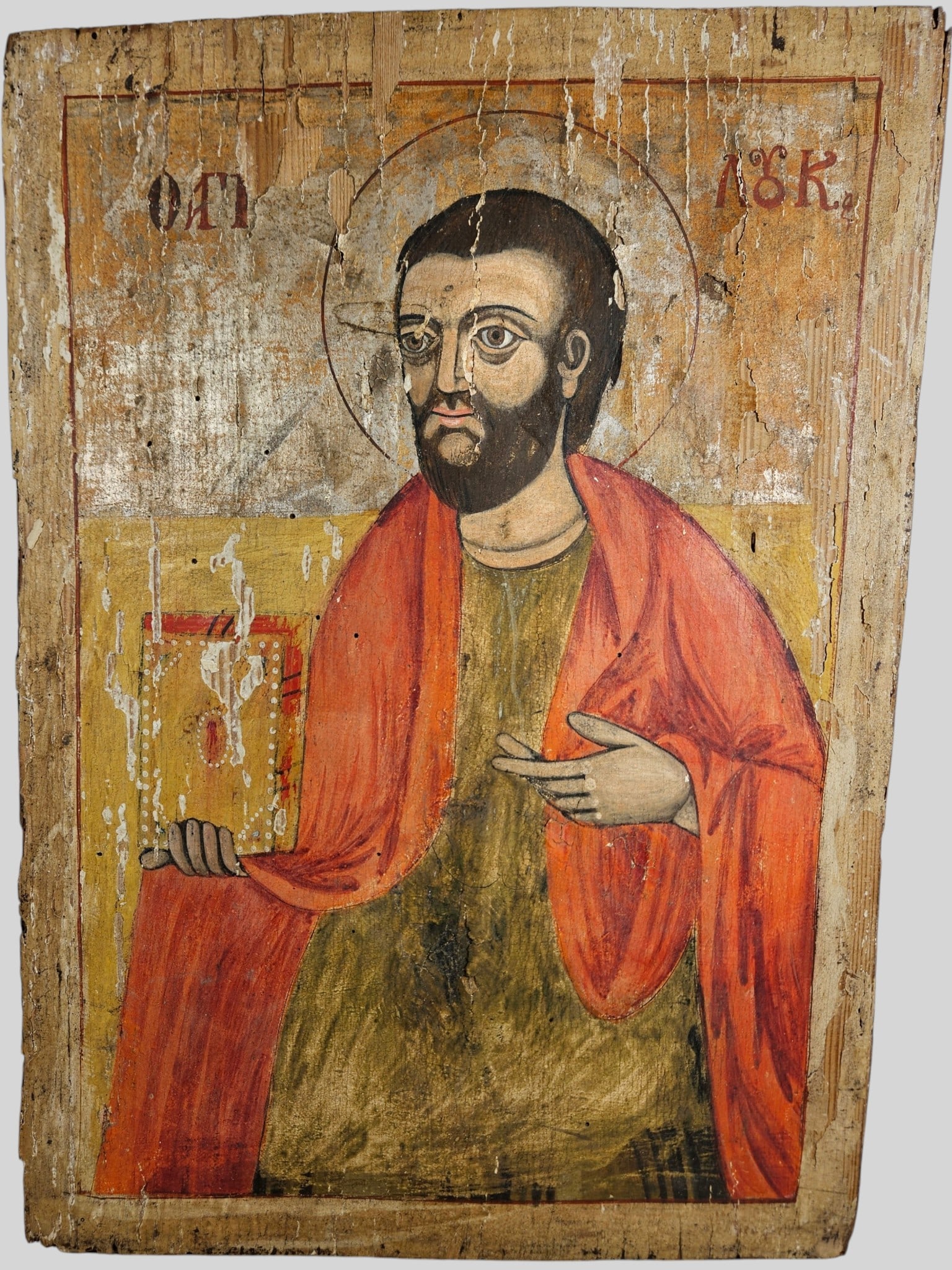 Antique Hand Painted Eastern Orthodox Icon Of Saint Bartholomew: Depicting Saint Bartholomew (or alternately depicted as Saint Luke or the apostle Paul). Hand painted in the traditional Byzantine style, the piece is rendered in egg tempera on a single thick softwoo
