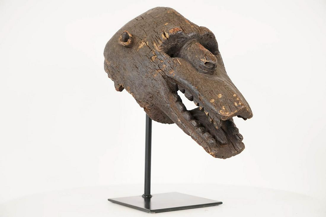 Bamana Zoomorphic Mask on Stand - Mali - African Tribal Art: Measurements (inches) & Weight (pounds) Height: 14.5" on stand Width: 8.5" Depth: 15" Weight: 5 lbs with stand An interesting zoomorphic mask with an open mouth expression that bears teeth.