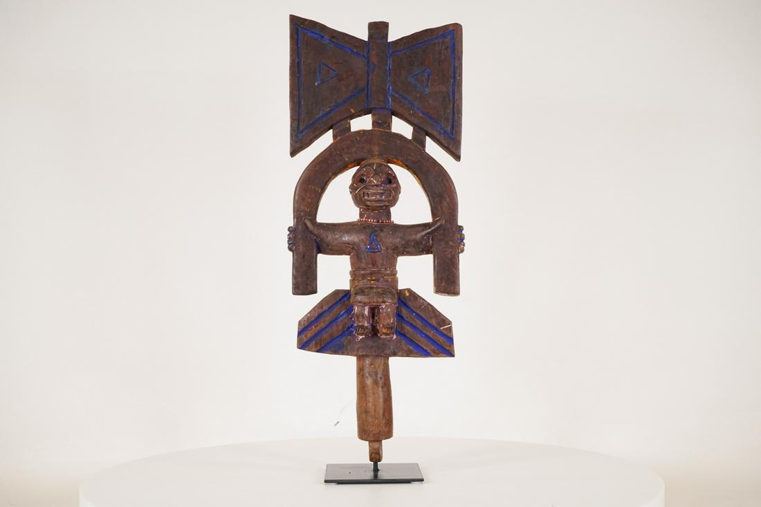 Yoruba Shango Figure on Base - Nigeria - African Tribal Art Sculpture: Measurements (inches) & Weight (pounds) Height: 19.5" Width: 7.5" Depth: 3" Weight: 2.5 lbs An interesting shango staff with indigo pigment accents attached to metal base. About the Shan