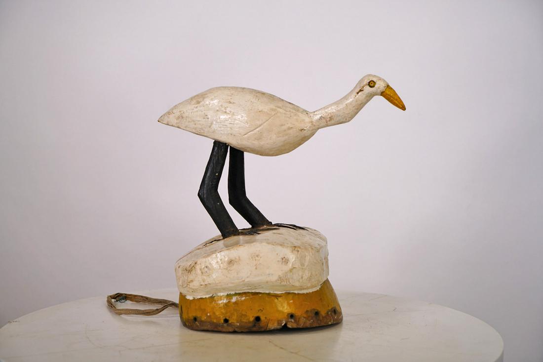Yoruba Egungun Mask with Bird Figure - Nigeria - African Tribal Art: Measurements (inches) & Weight (pounds) Height: 11.5" Width: 7.5" Depth: 12.25" Weight: 4 lbs A beautiful, white colored Yoruba Egungun style mask featuring a large bird figure on top.