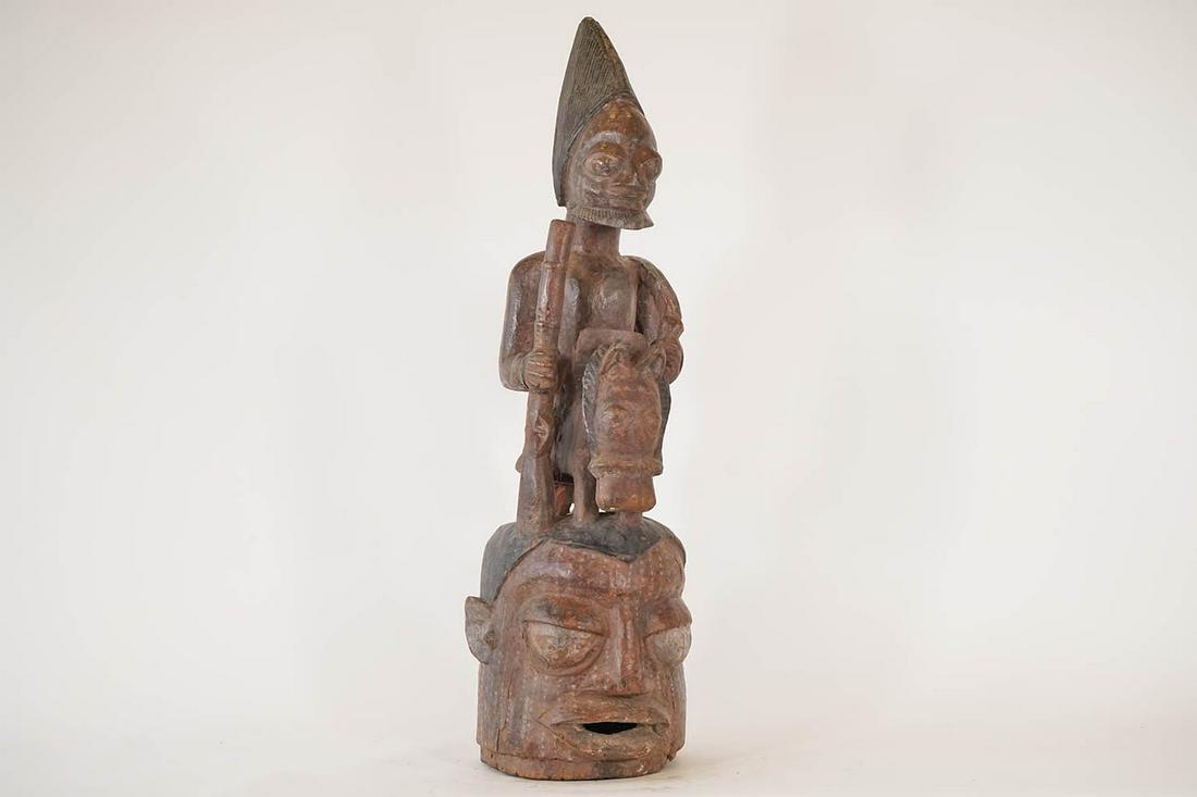 Yoruba Horse Rider Epa Mask from Nigeria - African Tribal Art Sculpture: Measurements (inches) & Weight (pounds) Height: 37" Width: 11" Depth: 12" Weight: 19 lbs A beautiful Yoruba Horse and Rider Epa mask from Nigeria. It features a seated rider on top of a horse and