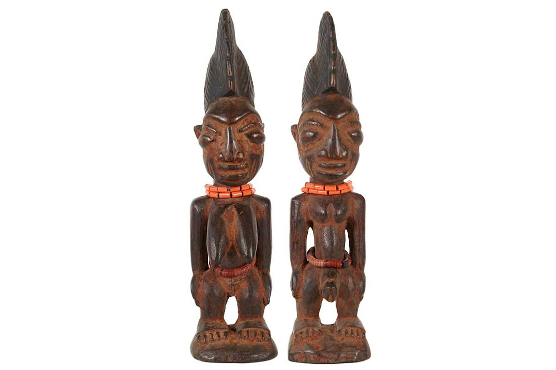 Yoruba Ibeji Pair from Nigeria - African Tribal Art Sculpture: Measurements (inches) & Weight (pounds) Height: 11.25" & 11.5" Width: 2.75" Depth: 3.5" Weight: 1 lb A beautiful male and female ibeji pair with brightly colored beaded necklaces. About