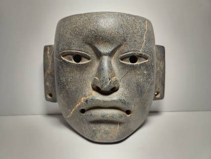 PRE-COLUMBIAN OLMEC STONE SERPENTINE MASK: PRE-COLUMBIAN OLMEC SERPENTINE MASKMEASURAMENT:5"HIGH,6 1/2" WIDE, 3" DEEP 1200BC 400AD