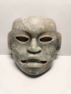 PRE-COLUMBIAN OLMEC JADE PECTORAL MASK: PRE-COLUMBIAN OLMEC JADE PECTORAL MASKMEASURAMENT: 3 1/2" BY 3 3/4"1200BC-400BC