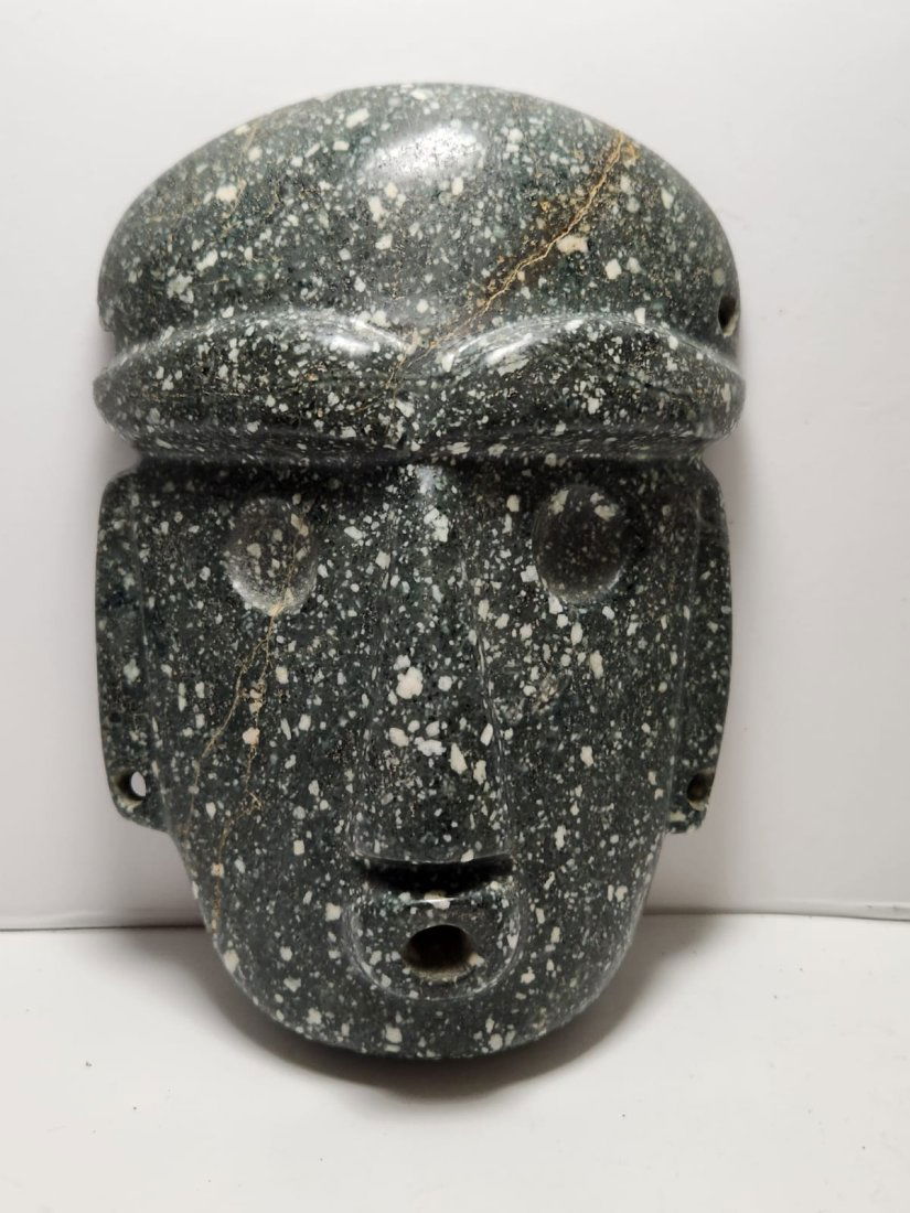 PRE-COLUMBIAN GRANITE MEZCALA PECTORAL MASK: PRE-COLUMBIAN GRANITE MEZCALA PECTORAL MASKMEASURAMENT: 5" HIGH, 4" WIDE300BC-400AD