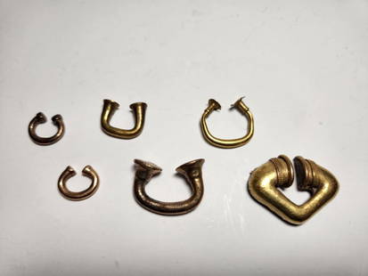 PRE-COLUMBIAN GOLD NOSE RINGS: PRE-COLUMBIAN GOLD NOSE RINGS FROM DIFERENT CULTURE MOCHE AND AZTEC COME FROM ARTE PRIMITIVOMEASURAMENT: 3/4" TO 1 1/2"1200AD-1550AD