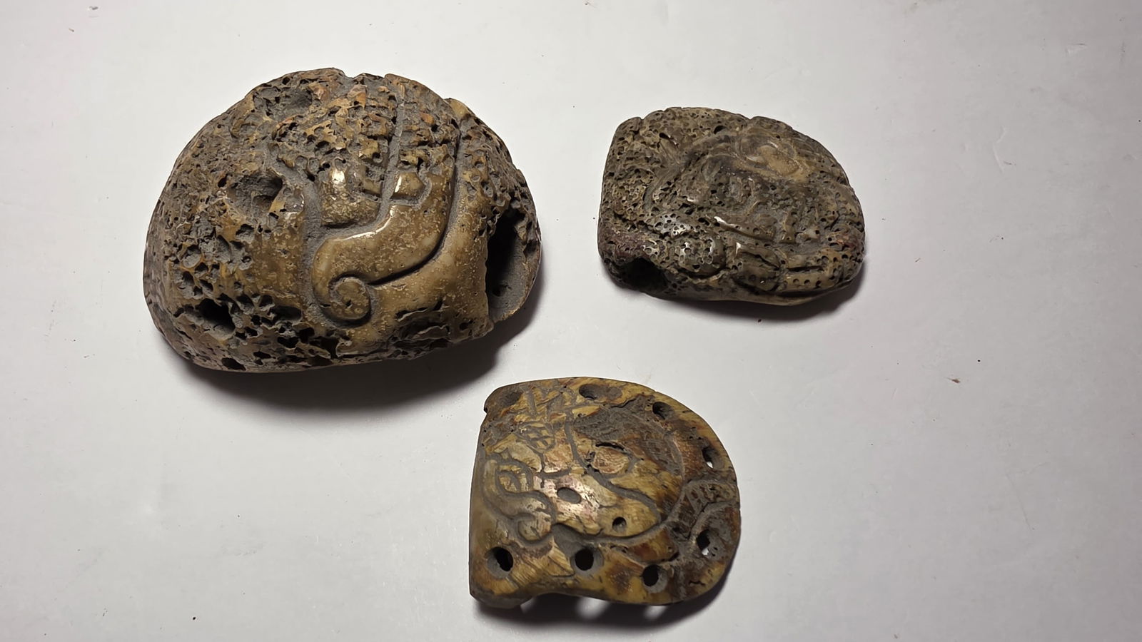 PRE-COLUMBIAN GROUP OF THREE MAYAN CARVED SHELL PENDANTS (1 of 6)