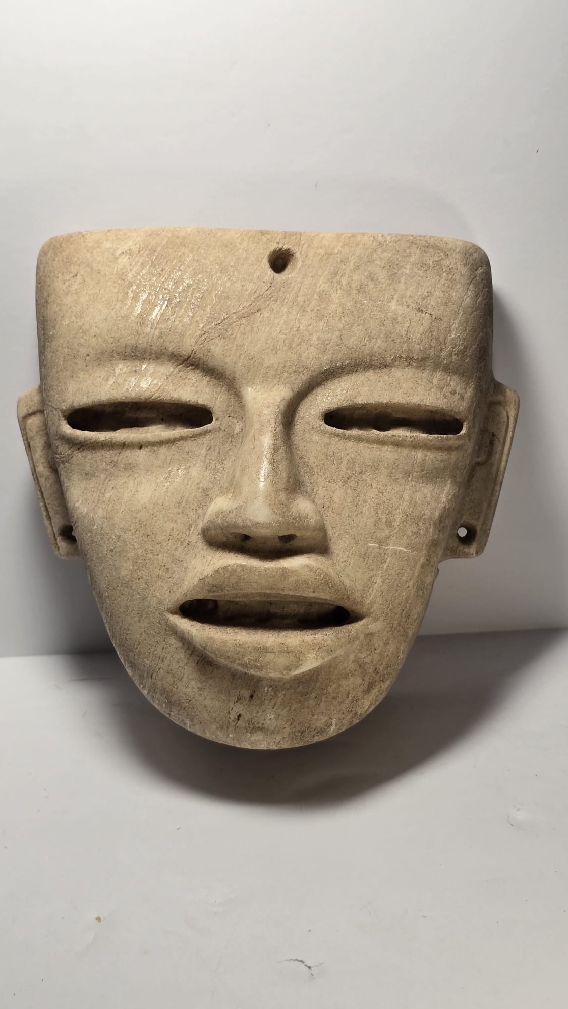 PRE-COLUMMBIAN TEOTIHUACAN ALABASTER MASK: PRE-COLUMMBIAN TEOTIHUACAN ALABASTER MASKRefined Teotihuacan alabaster mask, dating approximately 400 AD – 700 AD (Classic Period), consistent with the height of Teotihuacan cultural production. Mas