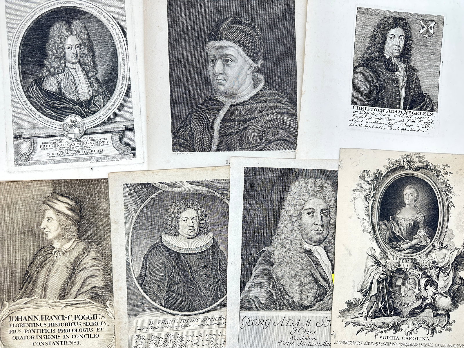 J. G. Mentzel and others – Set of 7 Portrait Engravings – European Scholars and Nobility: This set includes seven detailed engraved portraits from the late 17th to early 18th centuries, depicting various European scholars, religious figures, and noblemen, including Pope Leo X, Georg Adam S